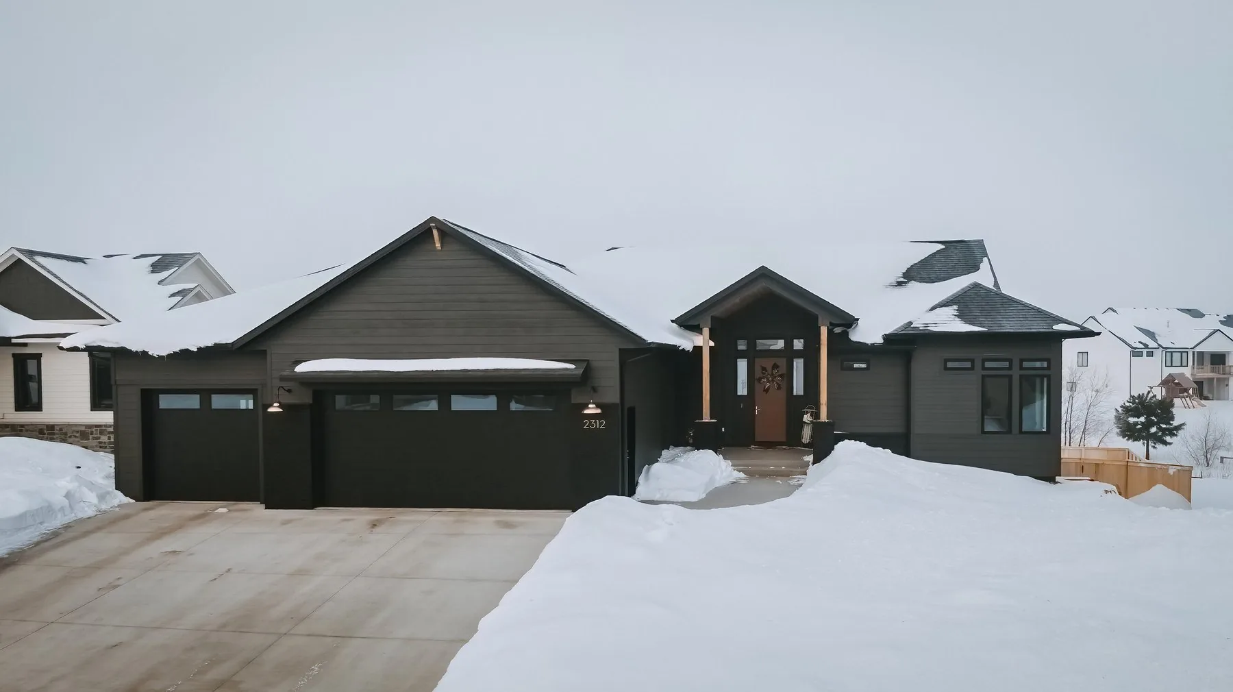 Galena Custom exterior in winter by Pride Built Homes