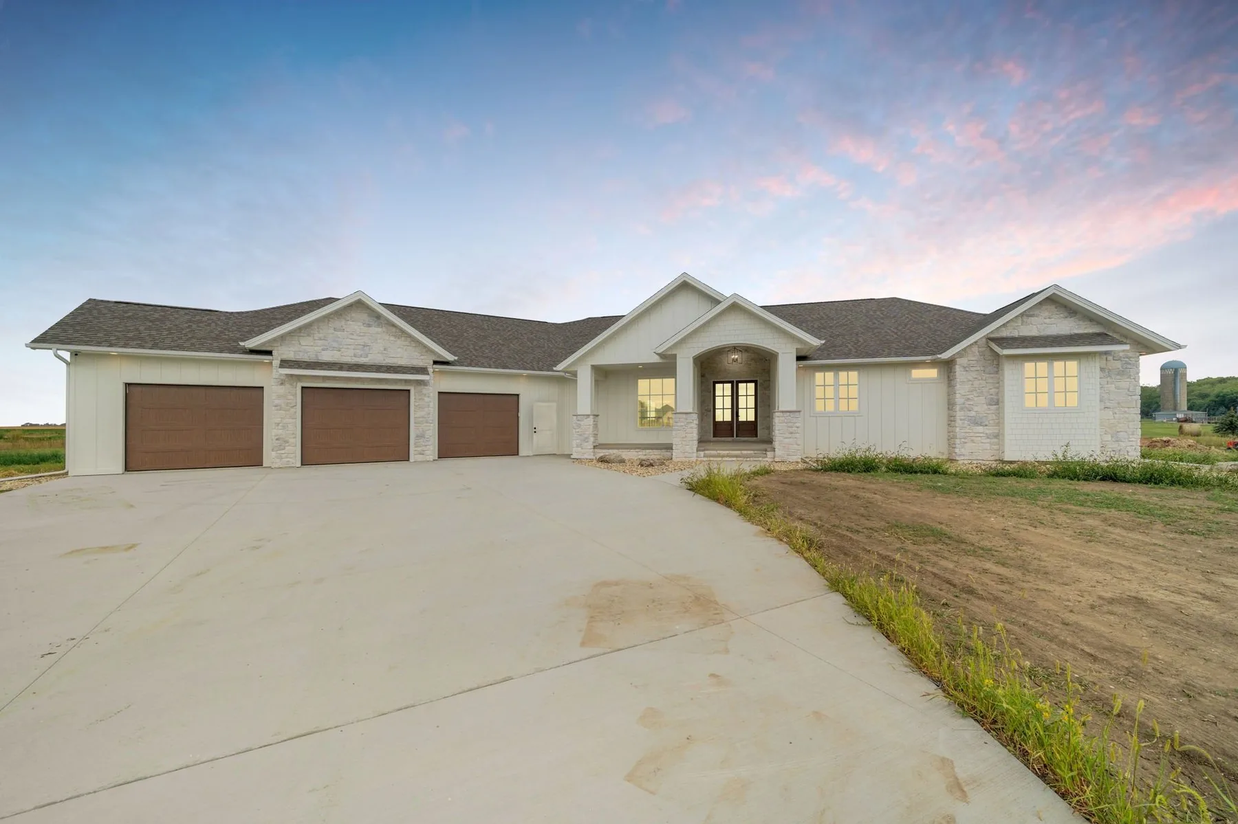 Lake Alvin Custom at dusk by Pride Built Homes