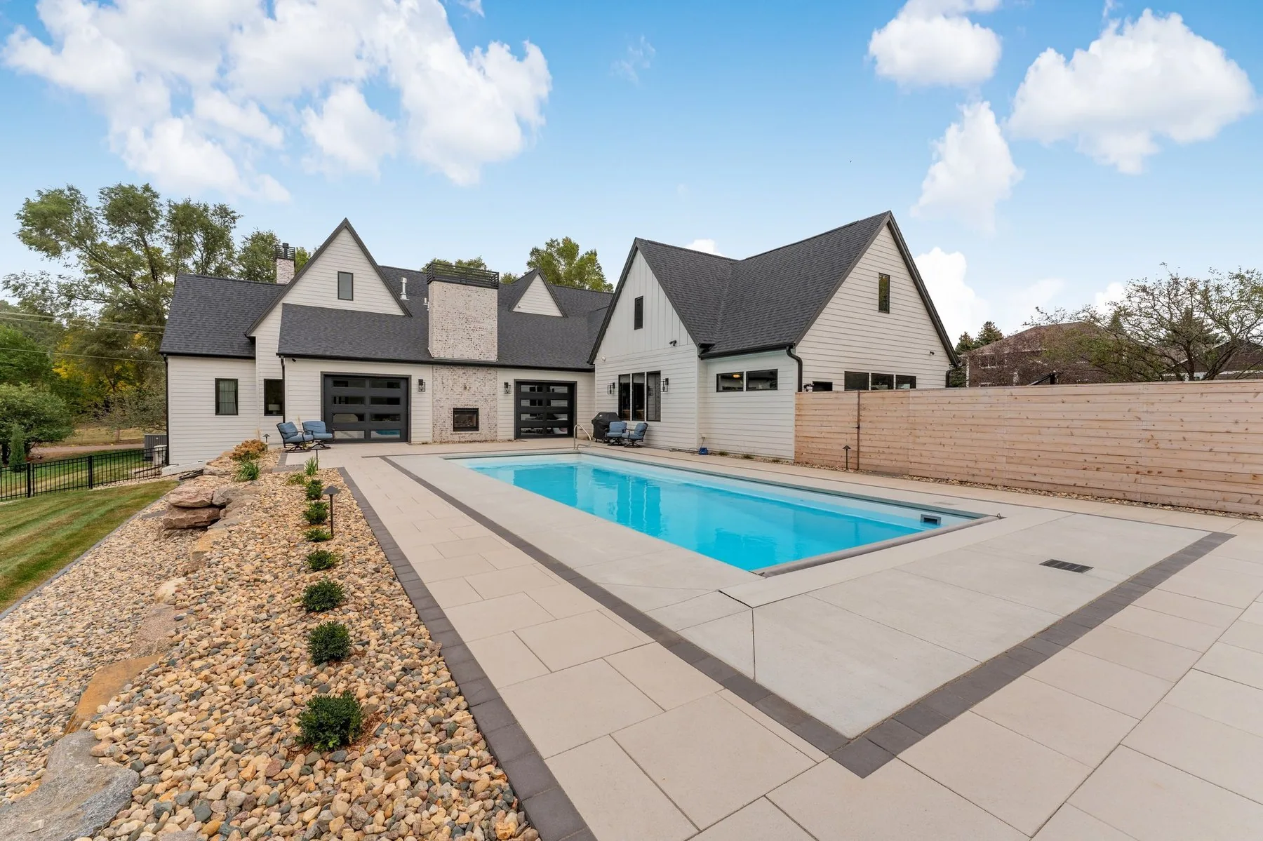 Old Orchard Custom rear elevation and pool by Pride Built Homes